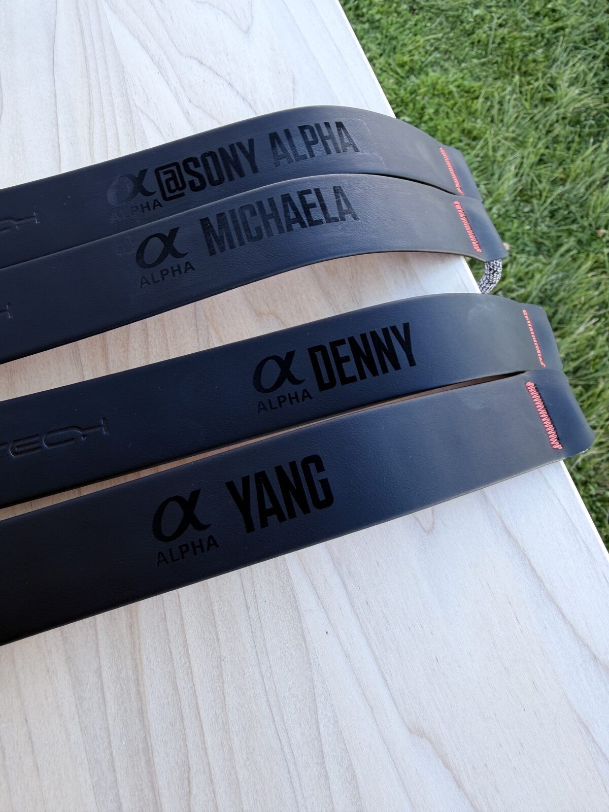 Laser-engraved leather straps personalized with names