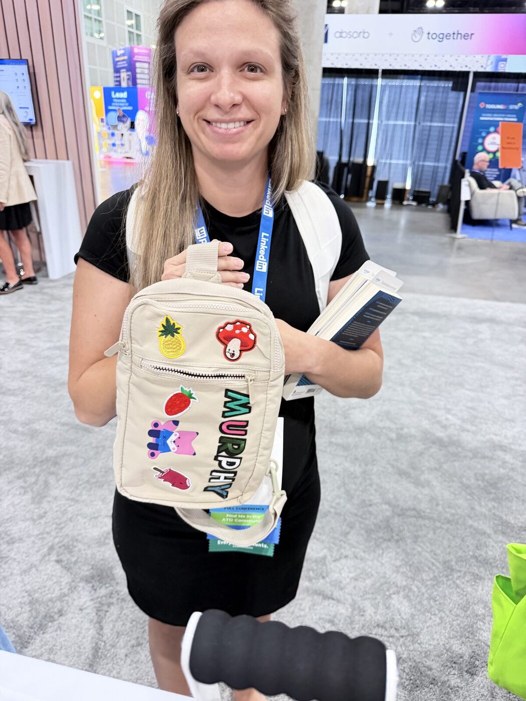 Guests carrying custom totes at an event
