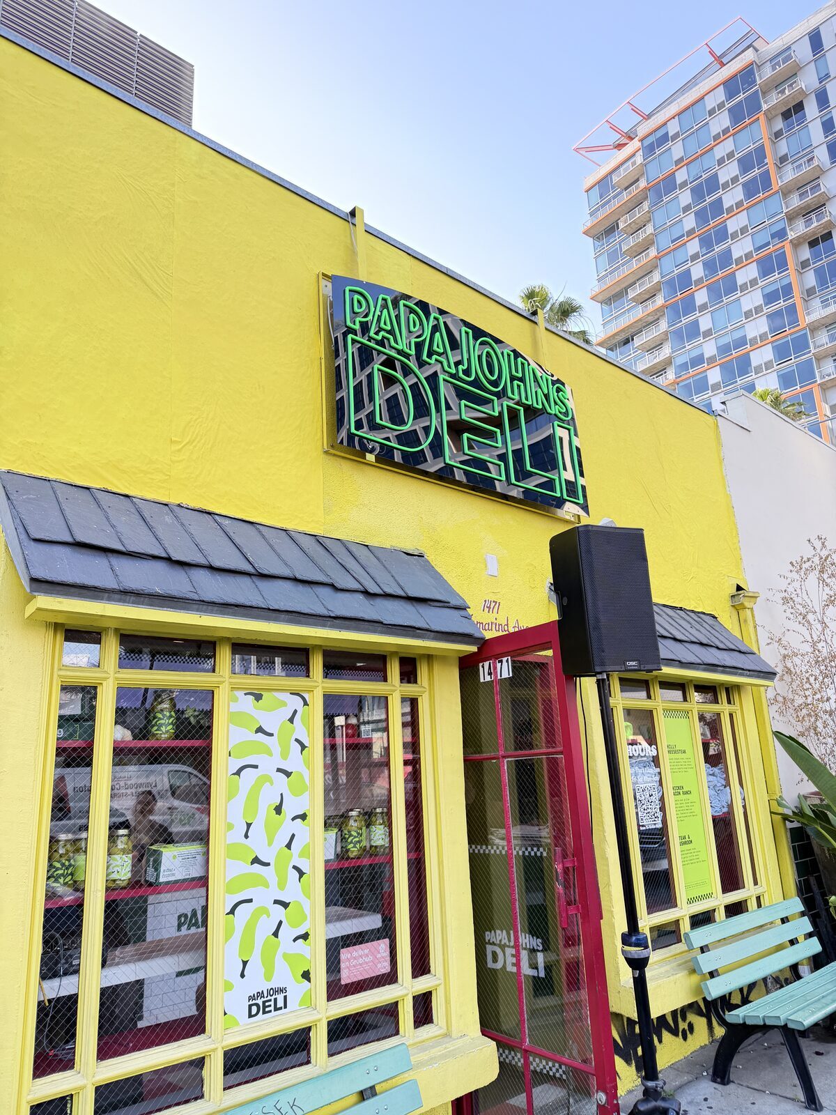 Crowd gathered outside a yellow storefront during a Los Angeles brand pop-up